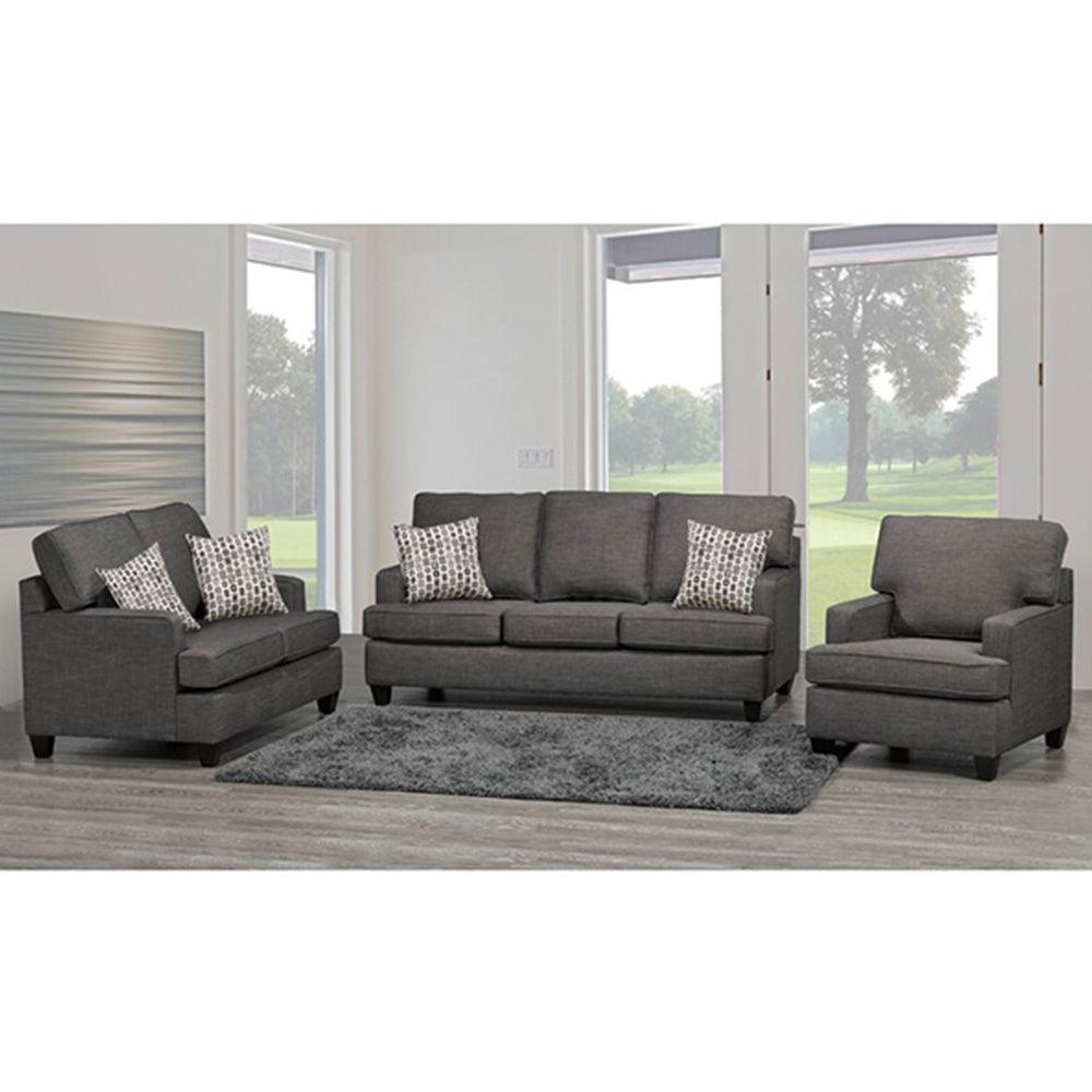 Gray sofa set with patterned cushions in a living room setting.