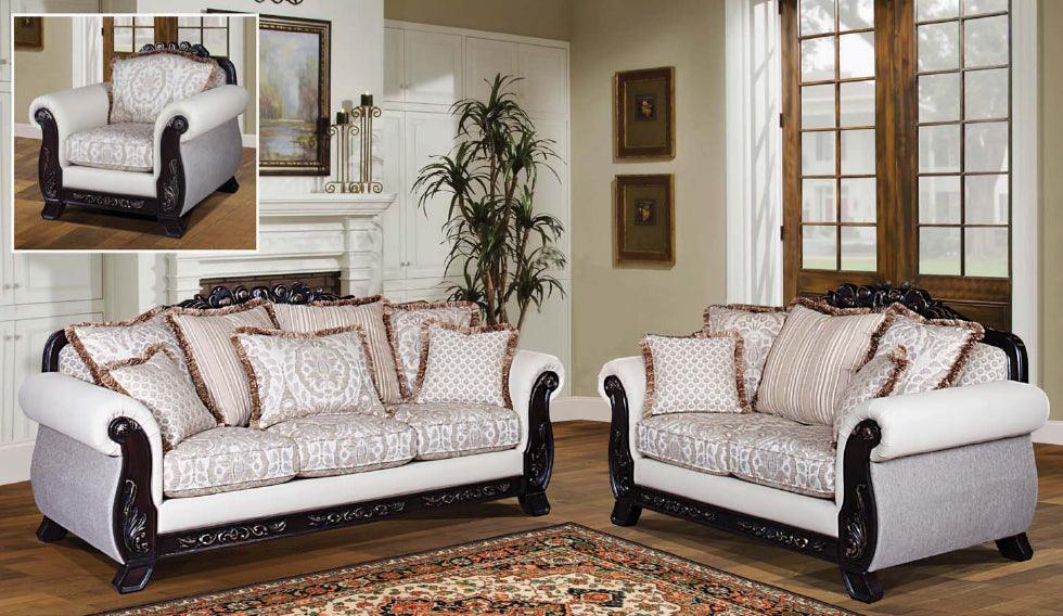 White sofa set with decorative cushions in a living room setting.
