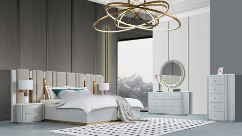 Modern bedroom with a large bed, nightstands, and a dresser.