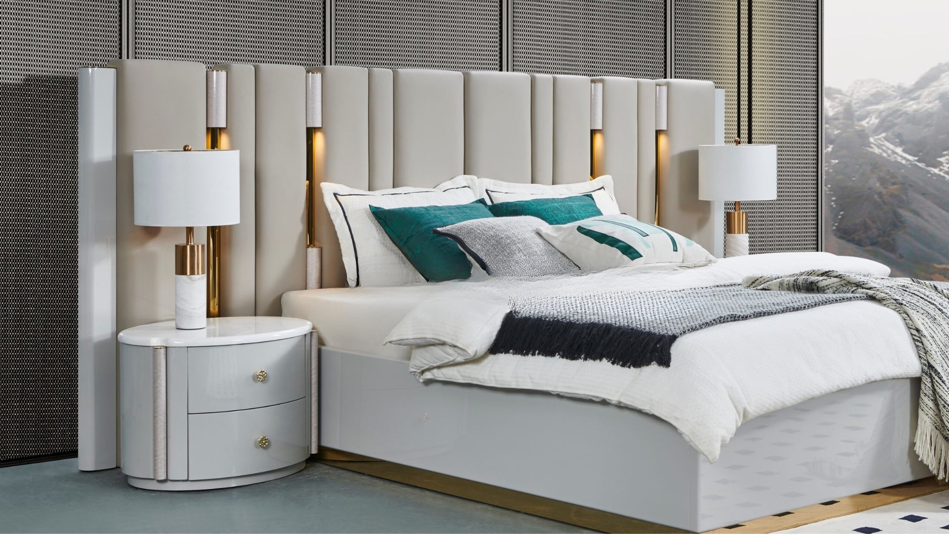 Modern bedroom with a bed, nightstands, and lamps.