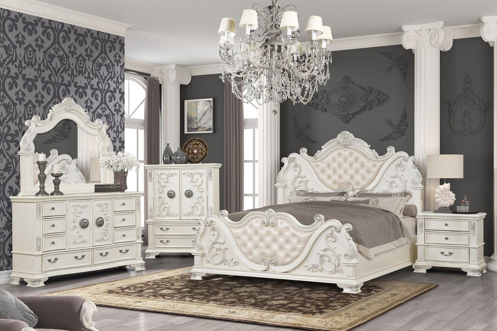 Elegant bedroom with white furniture, including a bed, dresser, and mirror, in a room with gray walls and decorative elements.
