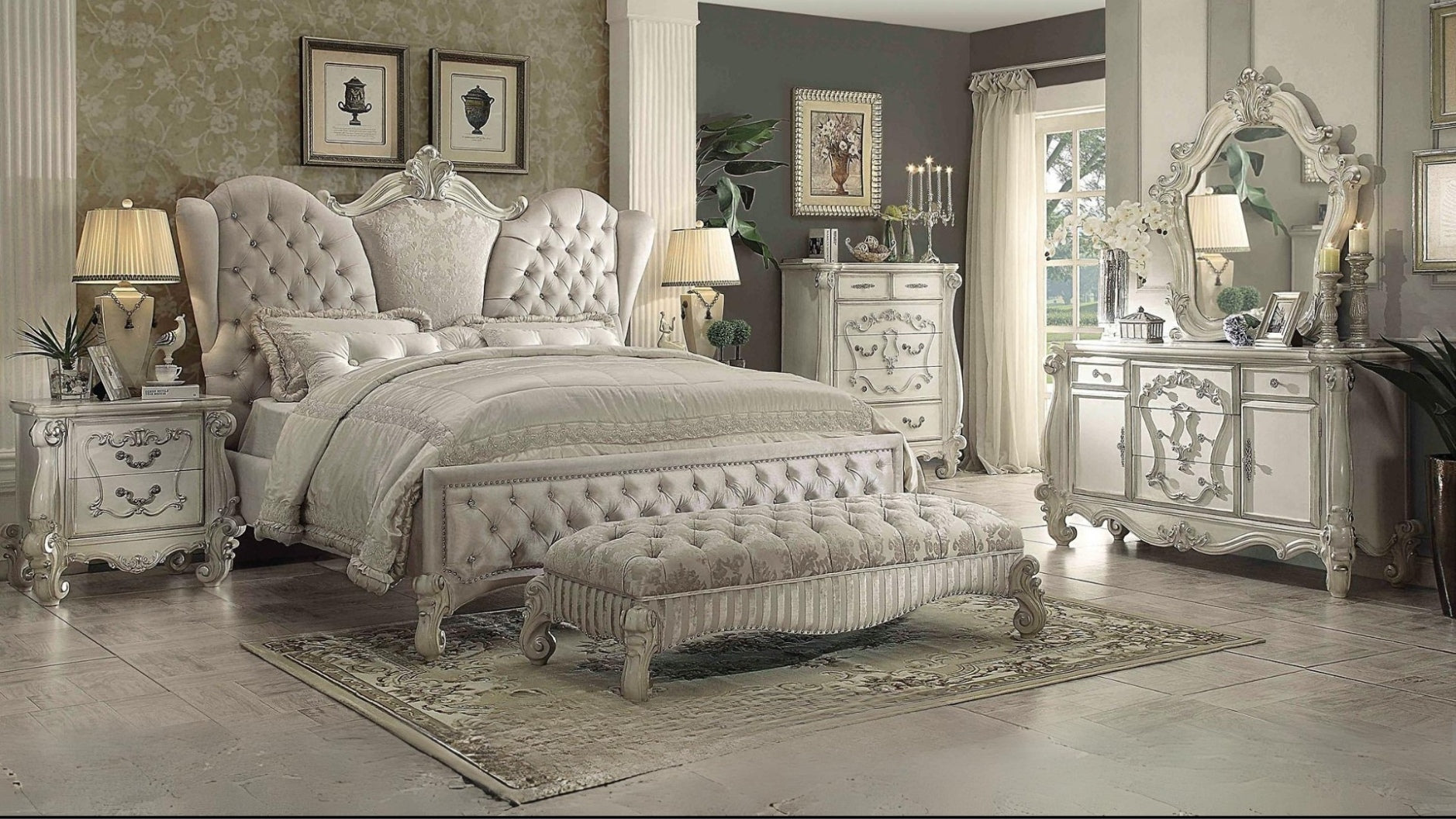 Elegant bedroom with ornate furniture and decorative elements.