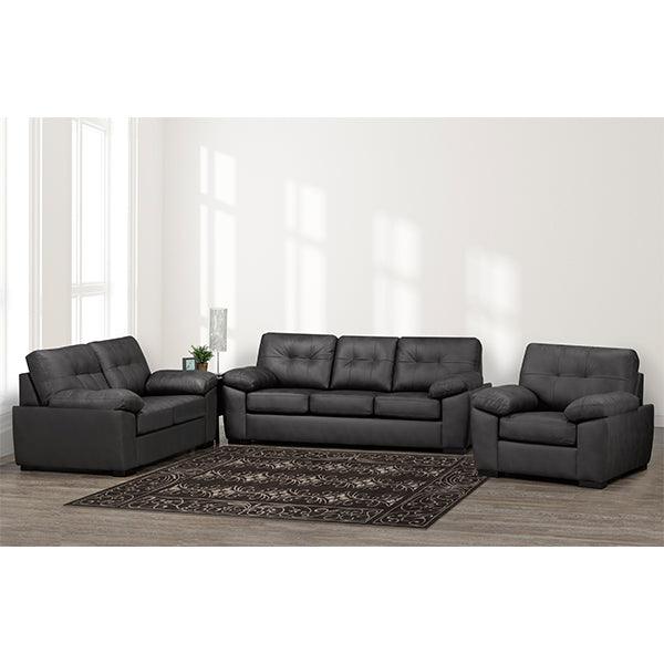 Gray sectional sofa set in a living room with a rug and decor items.