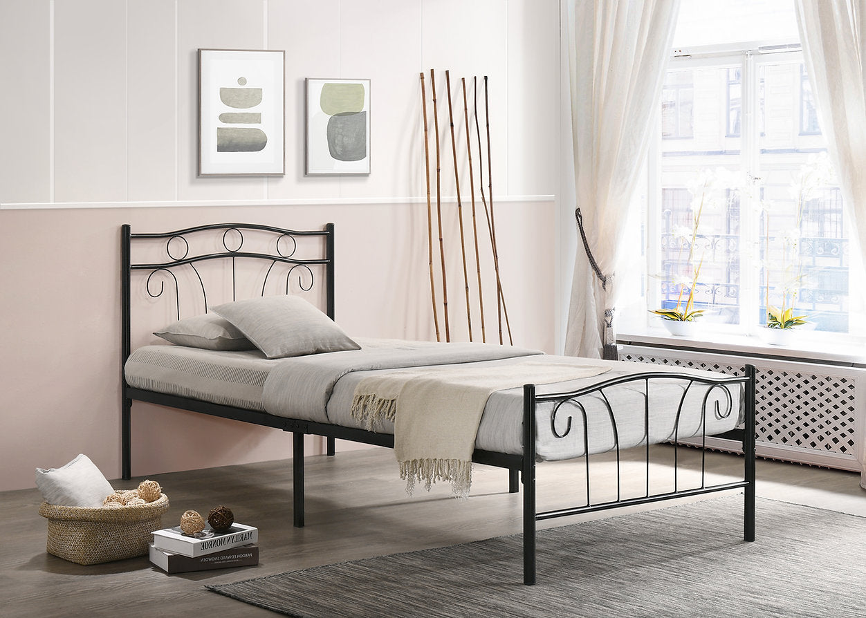 Black metal bed frame with white bedding in a bedroom setting.